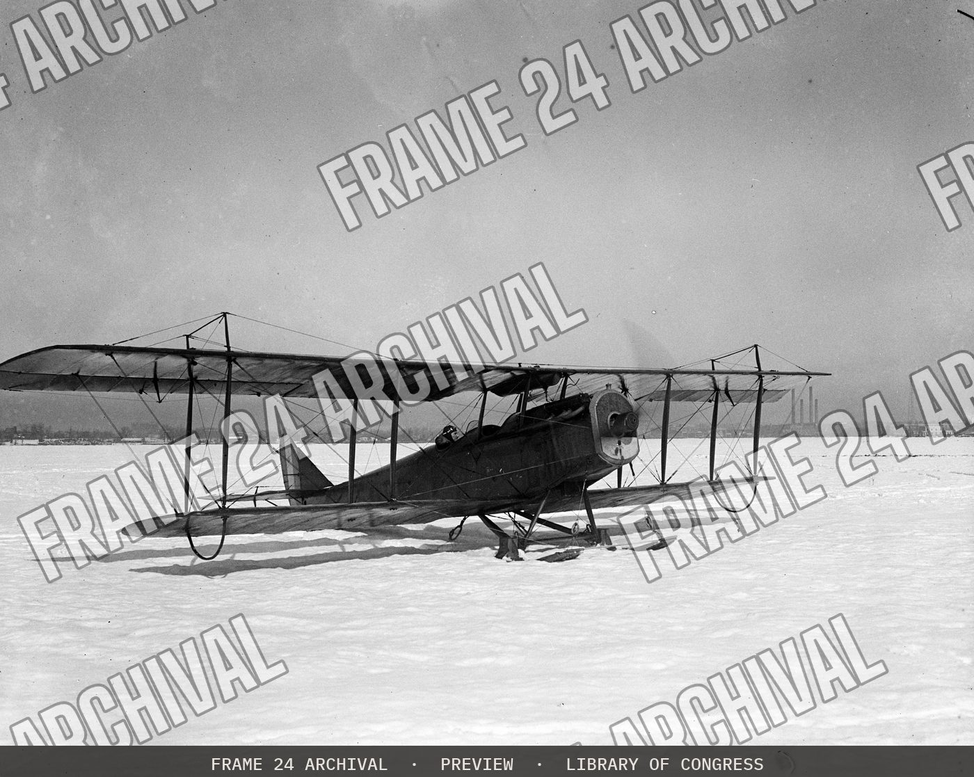 Airplane in snow (1922), restored vintage black and white photograph