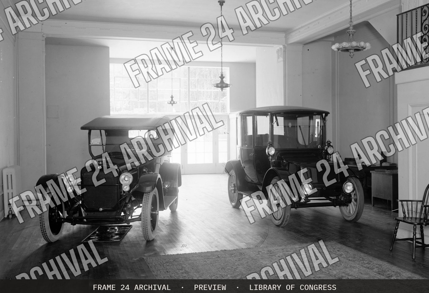 Automobile showroom (1921), restored vintage black and white photograph