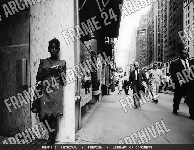 Bustling city street, vintage black and white photograph