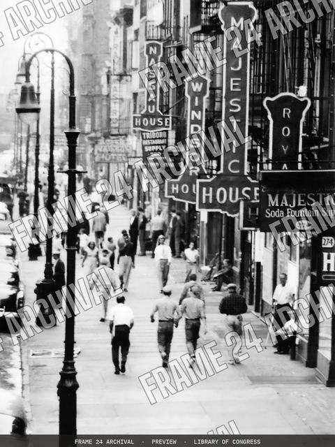 Busy street in New York City, vintage black and white photograph