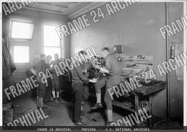Colleges and Universities - Harley Davidson School for Motorcycle Mechanics - Putting the parts of the motor together at school for motorcycle mechanics, vintage black and white photograph