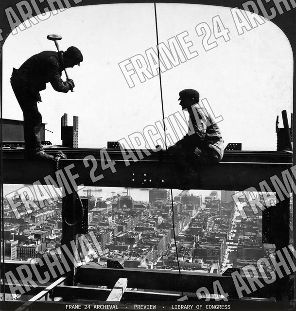 Construction men at work in great steel frame of Metropolitan Tower, looking toward East River, New York, U.S.A, vintage black and white photograph