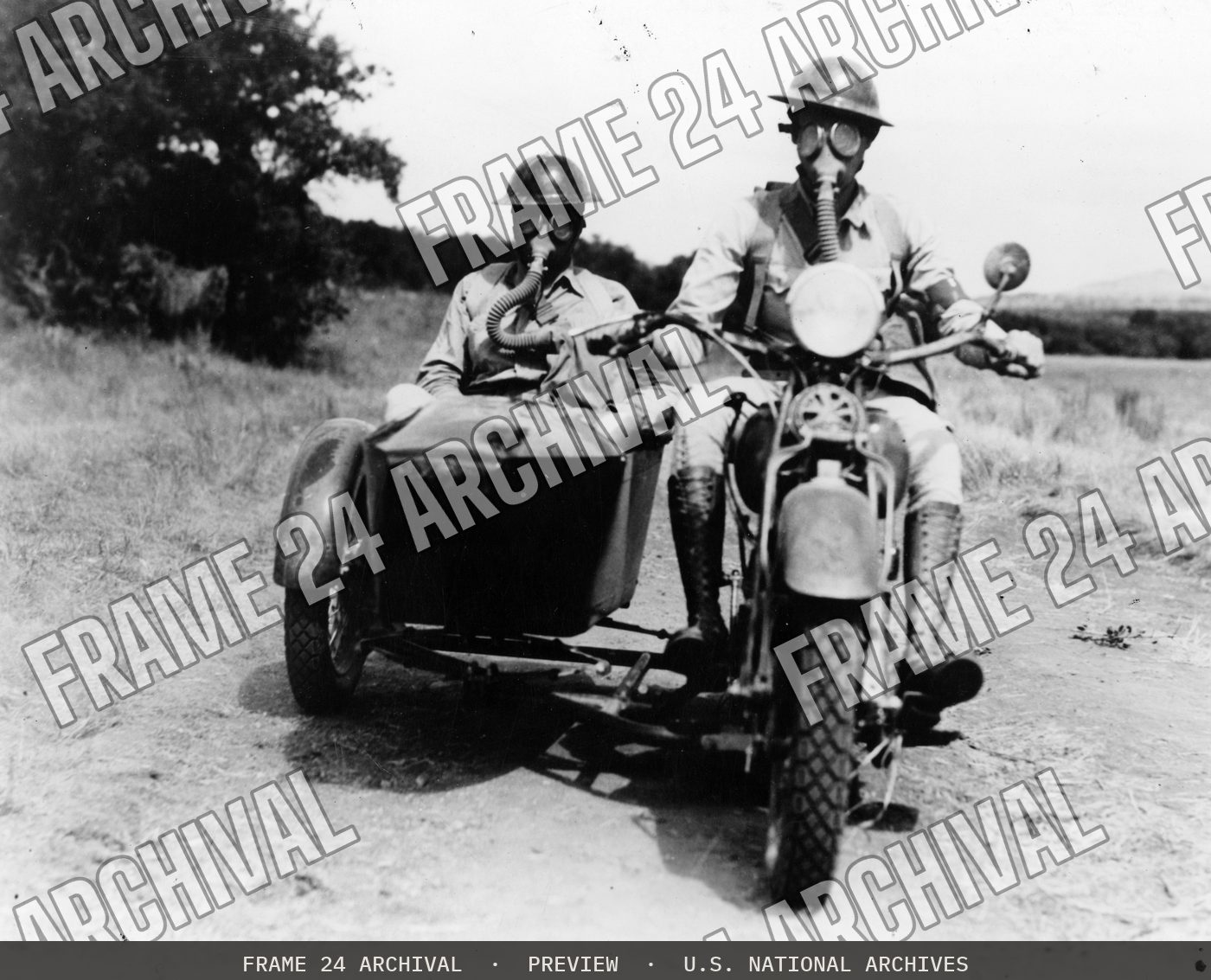 Motorcycle Reconnaissance Entering Gassed Area (1937), restored vintage black and white photograph