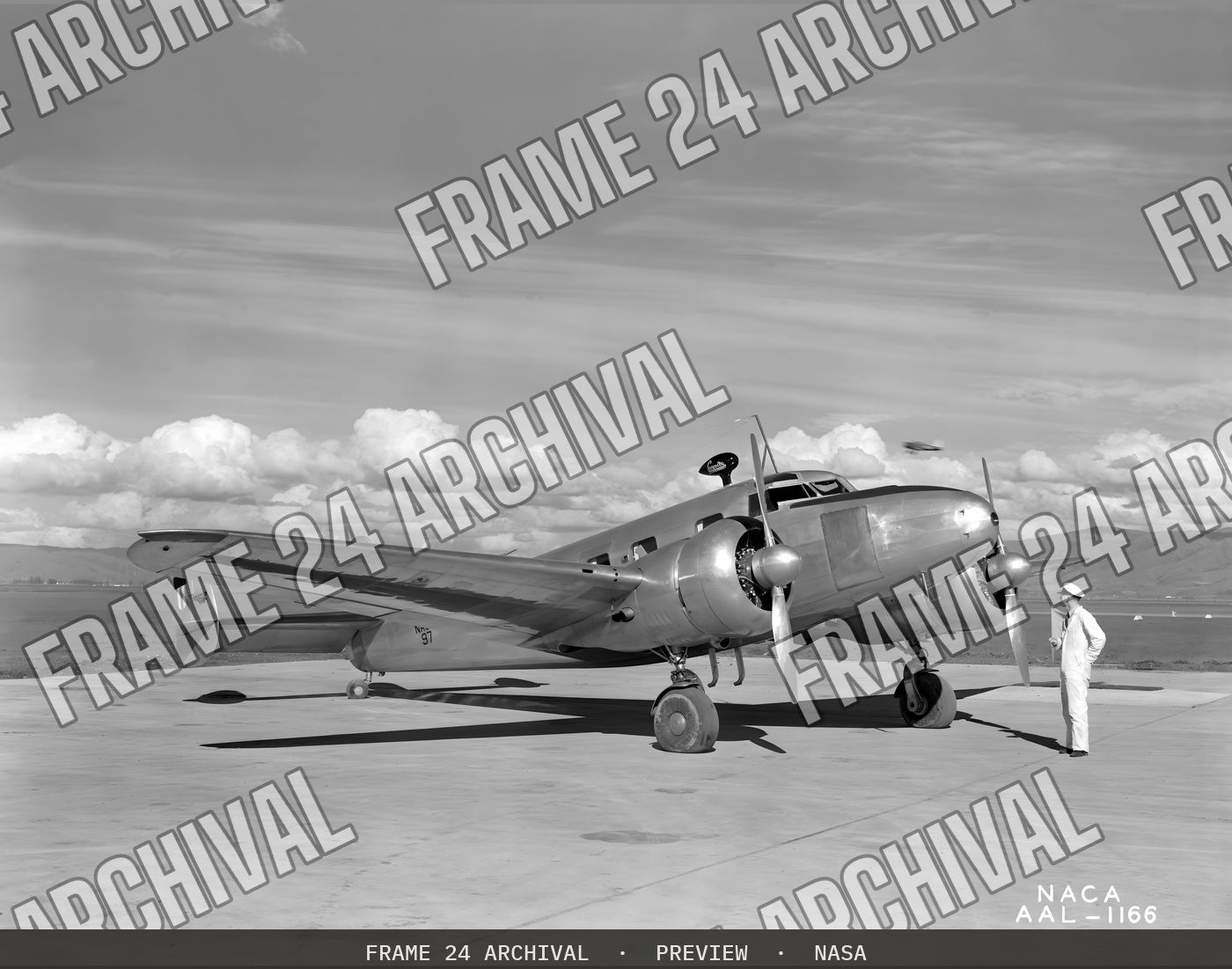 NACA photographer Lockheed 12A icing research airplane (1941), restored vintage black and white photograph