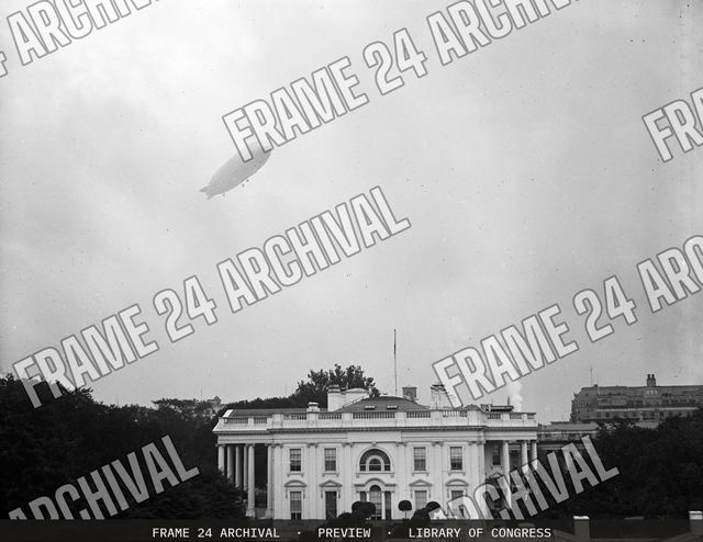 Navy ZR-1 airship flying over the White House, Washington, D.C., September 22, vintage black and white photograph