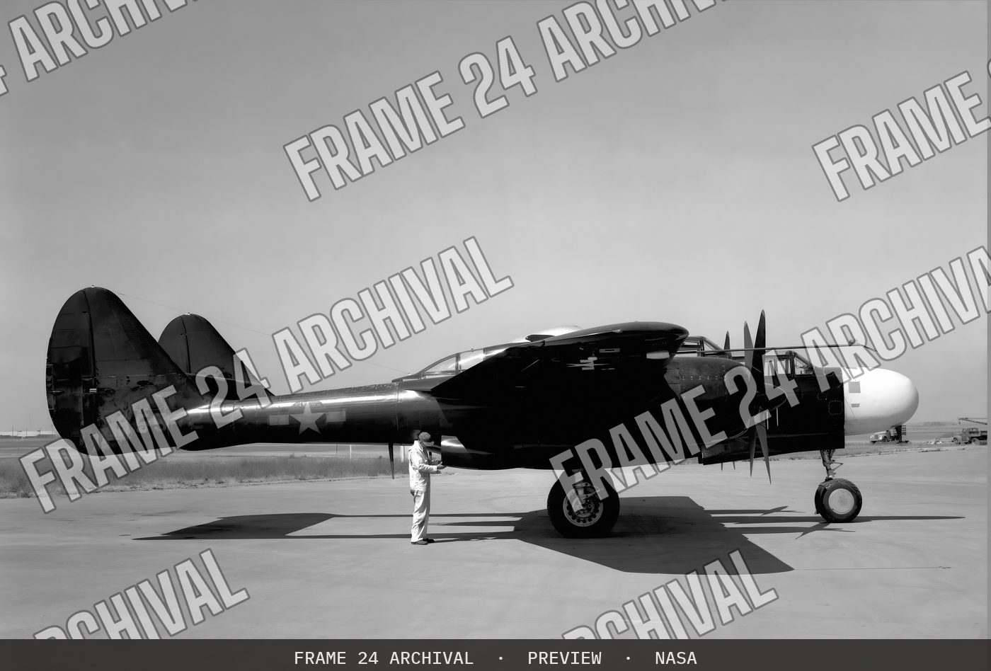 P-61A Airplane at NACA Ames Research Center, Moffett Field, California (1944), restored vintage black and white photograph