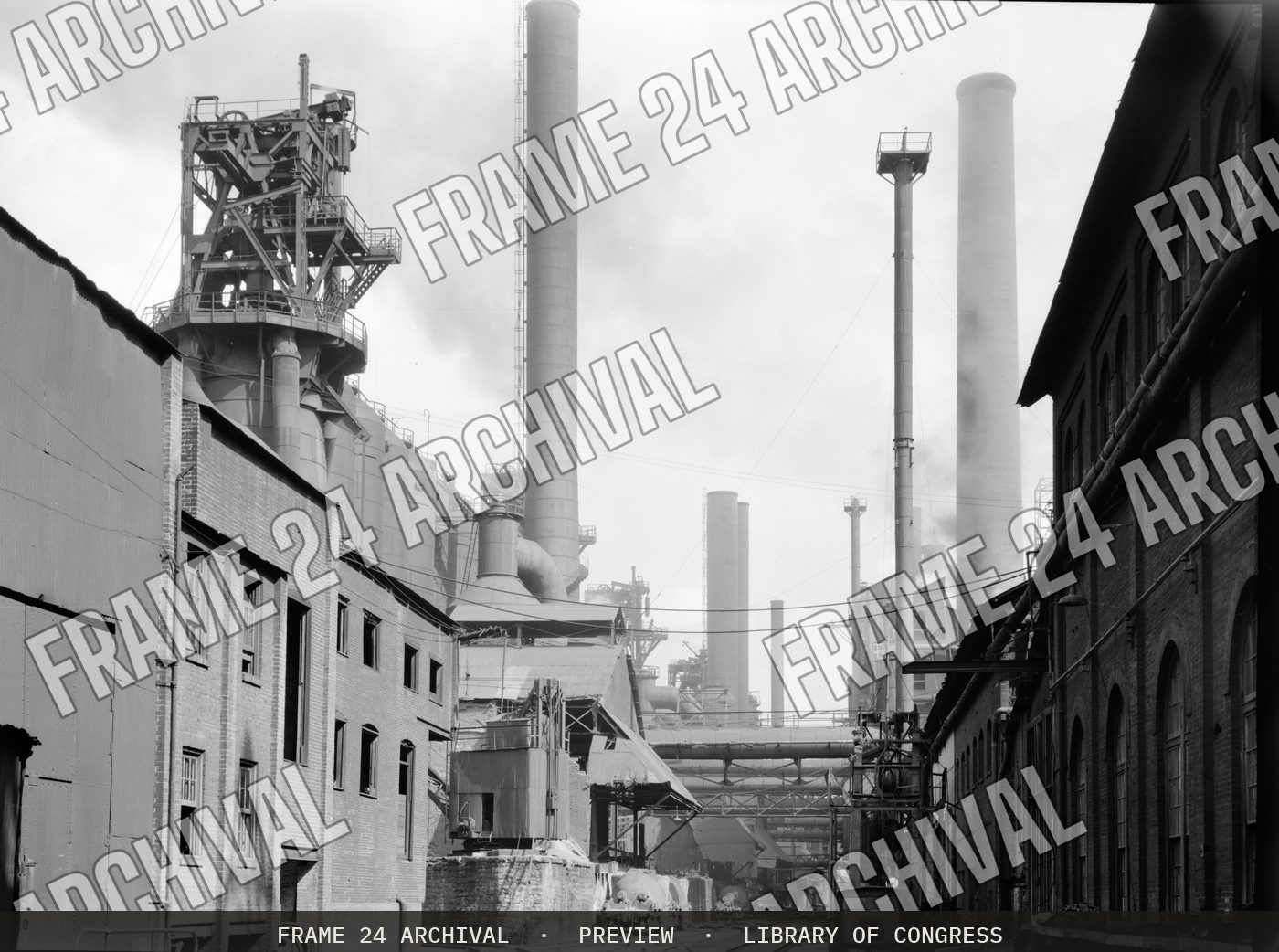 Steel mill. Pittsburgh, Pennsylvania (1938), restored vintage black and white photograph