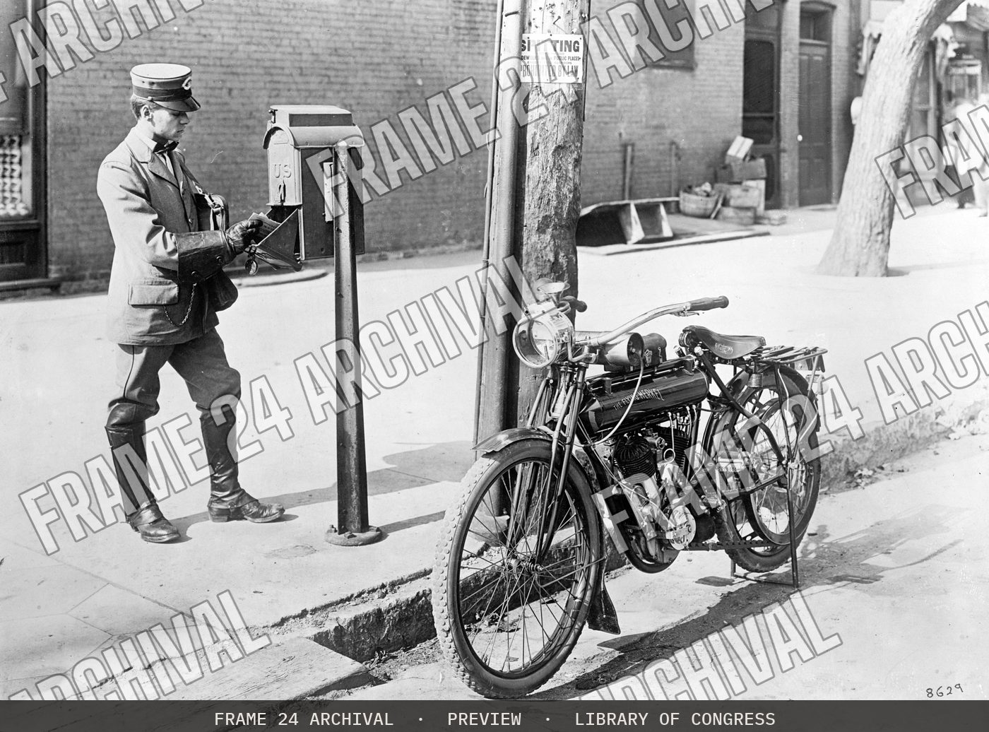 U.S. mailman & motorcycle (1909), restored vintage black and white photograph
